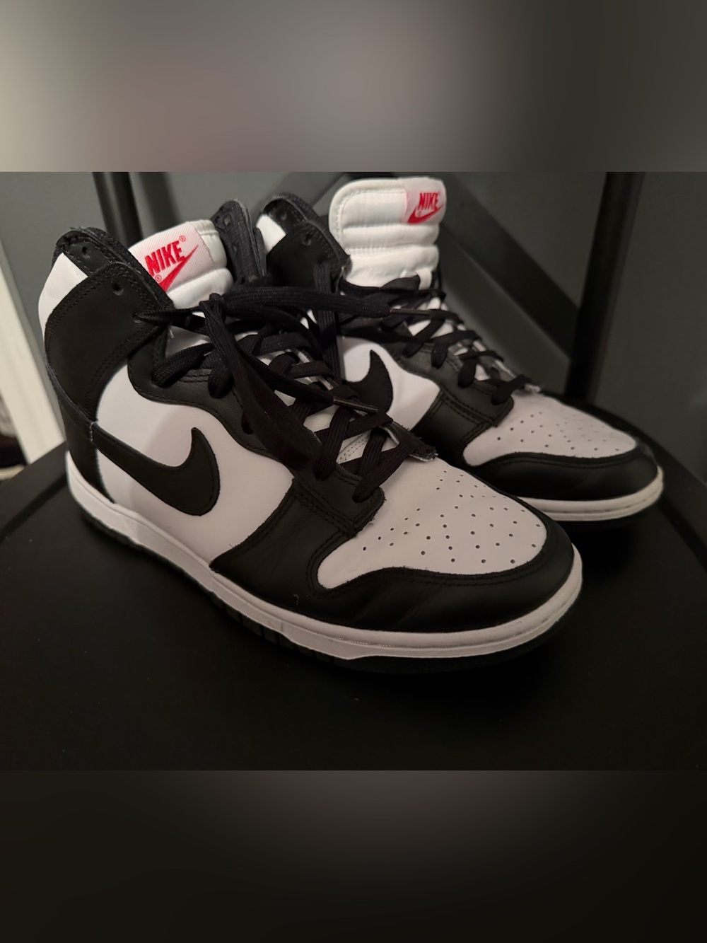 Nike Black and White High-Top Sneakers with Red Logo
